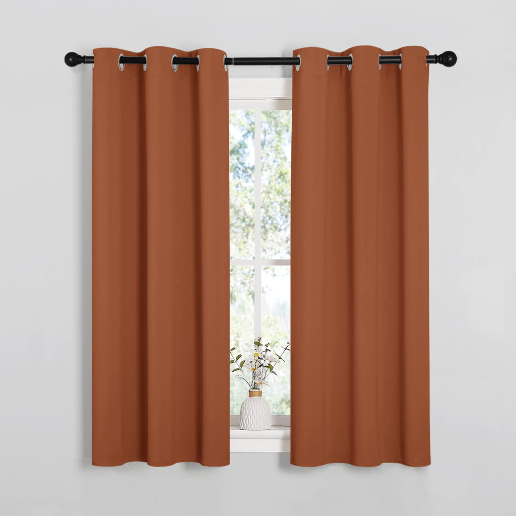 NICETOWN Blackout Halloween Draperies Curtains for Girls Room, Nursery Essential Thermal Insulated Grommet Top Blackout Panels (Burnt Orange, 1 Pair, 34 x 54 inches)