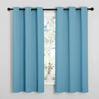 NICETOWN Window Treatment Thermal Insulated Solid Grommet Room Darkening Curtains/Drapes for Bedroom (Set of 2 Panels, 42 by 63 inches Long, Teal Blue=Light Blue)