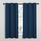 NICETOWN Window Curtain Panels, Thermal Insulated Solid Grommet Blackout Draperies/Drapes for Basement (Moroccan Blue, 1 Pair, 34 by 54-inch)