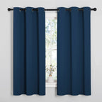 NICETOWN Bedroom Curtain Panels Blackout Draperies, Thermal Insulated Solid Grommet Blackout Curtains/Drapes (Moroccan Blue, 1 Pair, 29 by 40-inch)