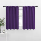 NICETOWN Bedroom Curtain Panels for Kids Room, Triple Weave Home Decoration Thermal Insulated Solid Blackout Curtains & Drapes for Nursery (Set of 2, 34-inch x 63-inch, Royal Purple)