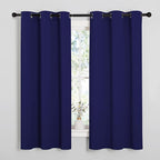 NICETOWN Blackout Draperies Curtains, All Season Thermal Insulated Solid Grommet Top Blackout Curtains/Drapes for Kid's Room (Royal Blue, 1 Pair, 34 x 63 inches)