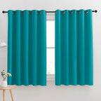 NICETOWN Thermal Insulated Peacock Teal Blackout Curtains for Bedroom, Window Treatment Solid Grommet Room Darkening Drape Panels for Bedroom (Set of 2, 70 by 63 inches Long)