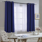 NICETOWN Blackout Curtain Panels Grommet - All Season Eyelet Top Blackout Draperies for Bedroom/Living Room/Glass Door， Navy Blue， 1 Pair of 52 x 45 inches