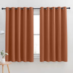 NICETOWN Thermal Insulated Burnt Orange Blackout Curtains for Bedroom, Window Treatment Solid Grommet Room Darkening Drape Panels for Bedroom (Set of 2, 70 by 63 inches Long)