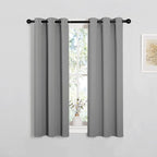 NICETOWN Silver Grey Blackout Curtain Panels for Bedroom, Thermal Insulated Grommet Top Blackout Draperies and Drapes (2 Panels, W29 x L45 inches)