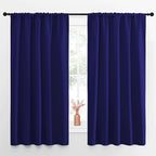 NICETOWN Curtains Blackout Draperies - Modern Design Thermal Insulated Solid Rod Pocket Top Blackout Drapes for Kid's Bedroom, Window Coverings (Navy Blue, 1 Pair, 52 x 63 inches)
