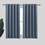 NICETOWN Thermal Insulated Curtains Blackout Draperies, Window Treatment Solid Grommet Room Darkening Drape Panels for Bedroom (Stone Blue, Set of 2, 70 by 54 inches Long)
