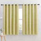 NICETOWN Thermal Insulated Paler Yellow Blackout Curtains for Bedroom, Set of 2, 70 by 63 inches Long, Window Treatment Solid Grommet Room Darkening Drape Panels for Bedroom