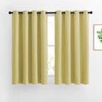 NICETOWN Room Darkening Curtains for Girls Room - Thermal Insulated Solid Grommet Room Darkening Panels/Drapes for Girl's Bedroom (Paler Yellow, 1 Pair, 52 by 54-Inch)