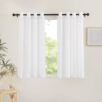 NICETOWN Sheer Curtains for Windows - Grommet Top Ivory Voile Window Treatment Drape Panels for Nursery/Small Window, 2-Pack, W54 x L45