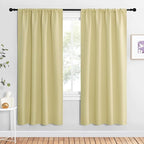 NICETOWN Blackout Curtains for Living Curtains, Paler Yellow, 2 Panels, 42 by 72, Room Darkening Window Curtain Panels, Easy-Care Solid Thermal Insulated Draperies/Drapes for Daughter Room
