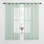 NICETOWN Sheer Curtains for Bedroom Windows, Grommet Top Voile Sheer Country Style Curtain Drapes Light and Airy Drapes for Children Room/Nursery, Sage Green, W54 x L63, 1 Pair