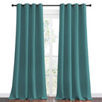 NICETOWN Blackout Curtains for Kids Room - Triple Weave Microfiber Home Thermal Insulated Solid Ring Top Blackout Panels/Drapes for Bedroom(Sea Teal, Set of 2, 55 x 96 Inch)